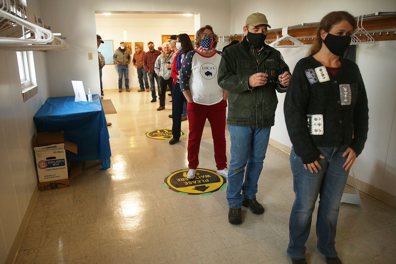 Voters line up down the hall and out the door